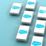 The Salesforce logo on a collection of phones.