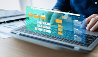Person on laptop using project management software