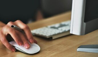 A mouse and desktop in use